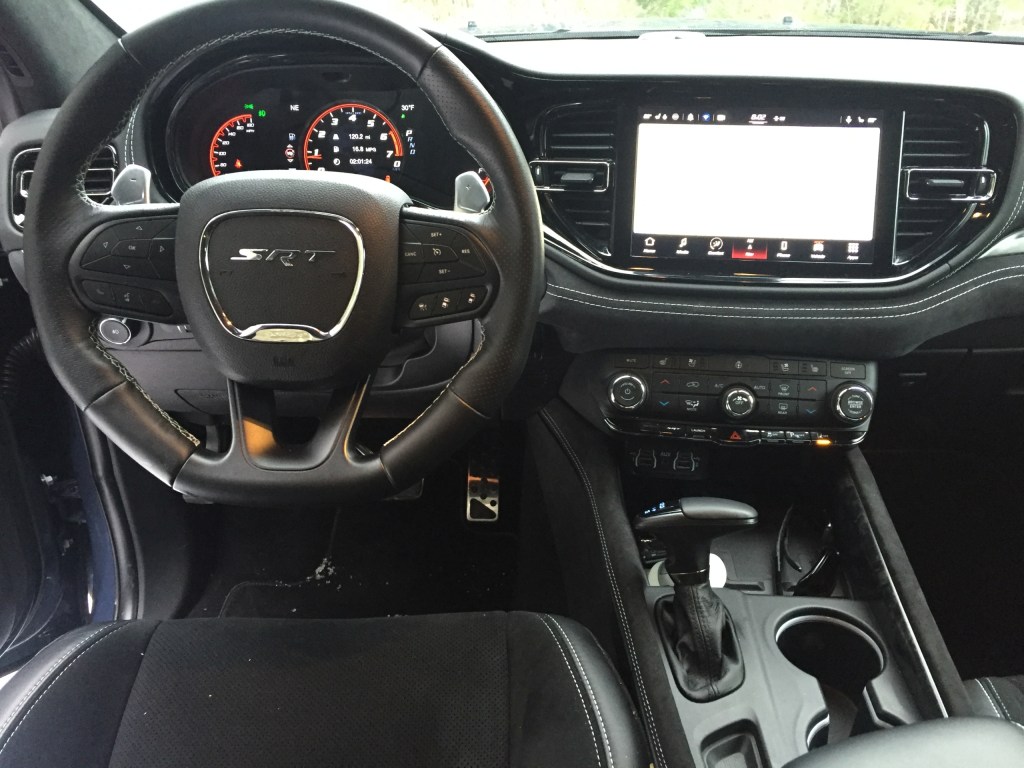 Interior highlights include a heated sport steering wheel, spacious second row seats with headrests that can be folded from up front, and third row seating that collapses to make an expandable load deck.