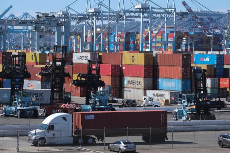 Cargo containers sit stacked at the Port of Los Angeles, Oct. 20, 2021 in San Pedro, Calif. (AP Photo/Ringo H.W. Chiu)