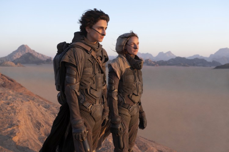 Timothee Chalamet, left, and Rebecca Ferguson in a scene from "Dune."
