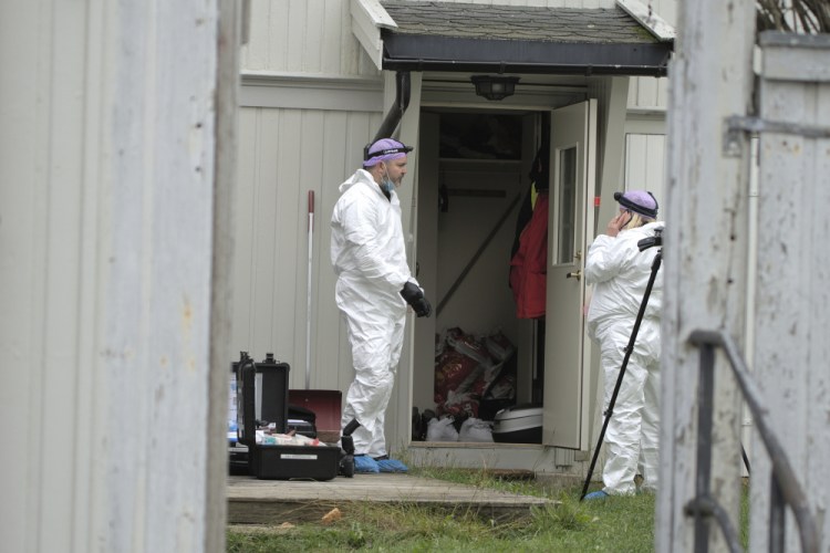 Technicians from the police investigate the apartment of the man who killed five people in a bow and arrow attack, in Kongsberg, Norway, Saturday.