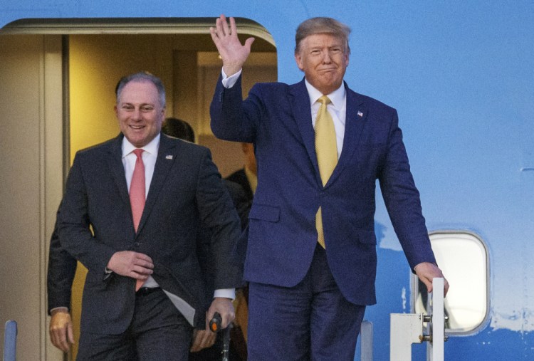 President Donald Trump and House Minority Whip Steve Scalise, R-La., arrive in Lake Charles, La., in 2019. 

