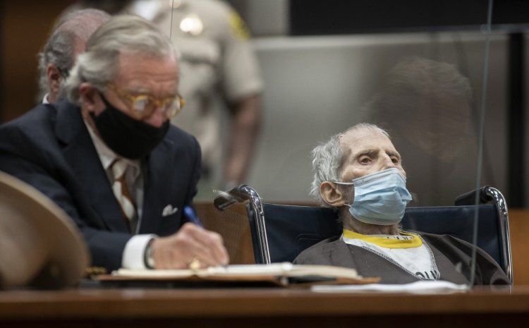 Robert Durst, seated with attorney Dick DeGuerin, is sentenced to life without possibility of parole for the killing of Susan Berman on Thursday at the Airport Courthouse in Los Angeles. 