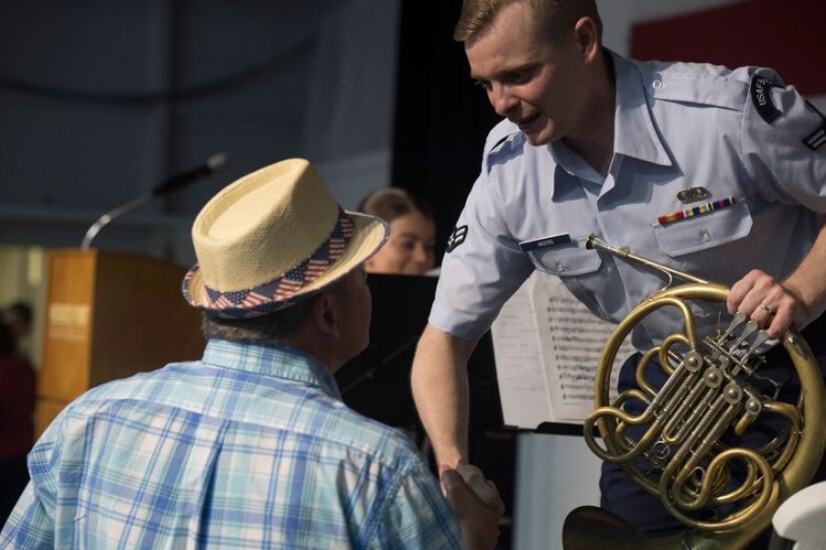 Senior Airman Derek Akers performs on French Horn for the United States Air Force (USAF) Heritage of America Band and the Heritage Winds ensemble.