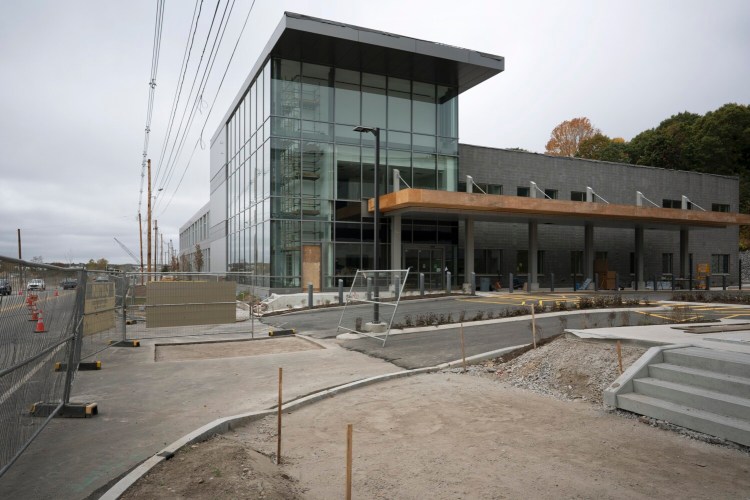 The glass entryway of the new Veterans Affairs clinic in Portland on Commercial Street will have a two-story mural displayed along with large medals for each branch of service. The facility will have a staff of about 140 and combine services currently offered at the VA clinics in Saco and Portland.