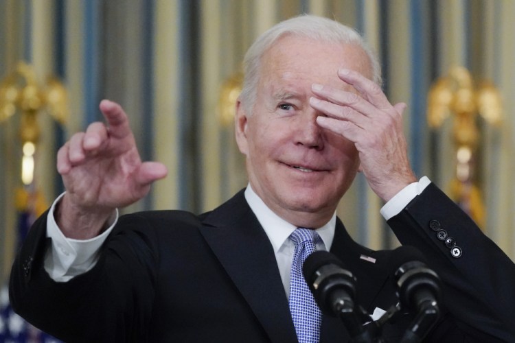 President Joe Biden jokes about which reporter to call on for a question as he speaks about the bipartisan infrastructure bill in the State Dinning Room of the White House on Saturday in Washington. 

