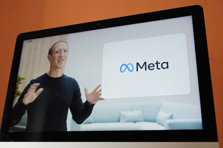 Seen on the screen of a device in Sausalito, Calif., Facebook CEO Mark Zuckerberg announces the company's new name, Meta, during a virtual event on Oct. 28.