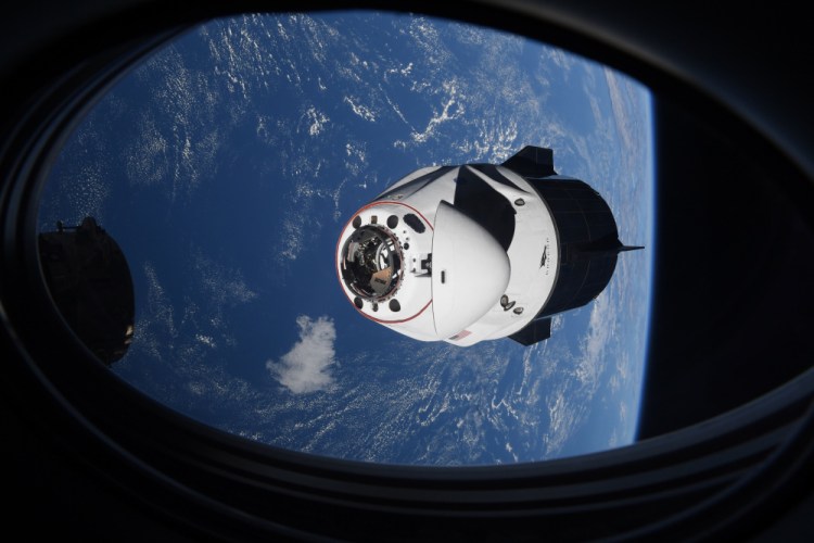 The SpaceX Crew Dragon capsule approaches the International Space Station for docking in this April 24 photo.   NASA says the International Space Station remains at increased risk from orbiting debris following this week's Russian weapons test. 