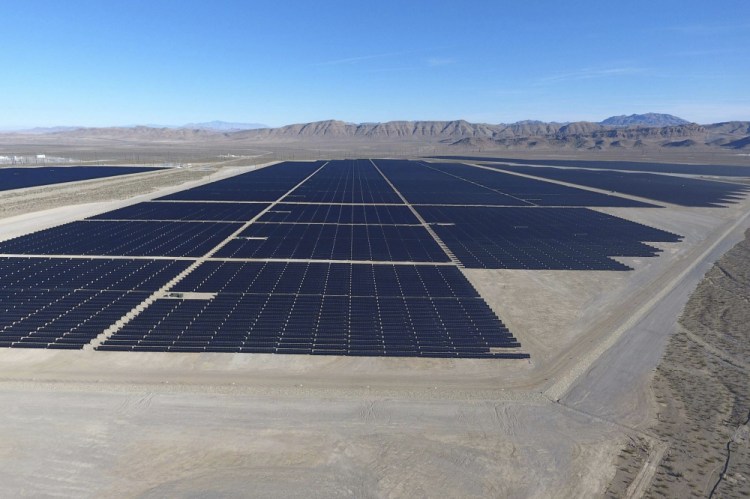 Solar arrays line the desert floor of the Dry Lake Solar Energy Zone in Las Vegas in 2017. The Biden administration on Tuesday issued a solicitation for interest in developing solar power on public lands in Nevada, New Mexico and Colorado.