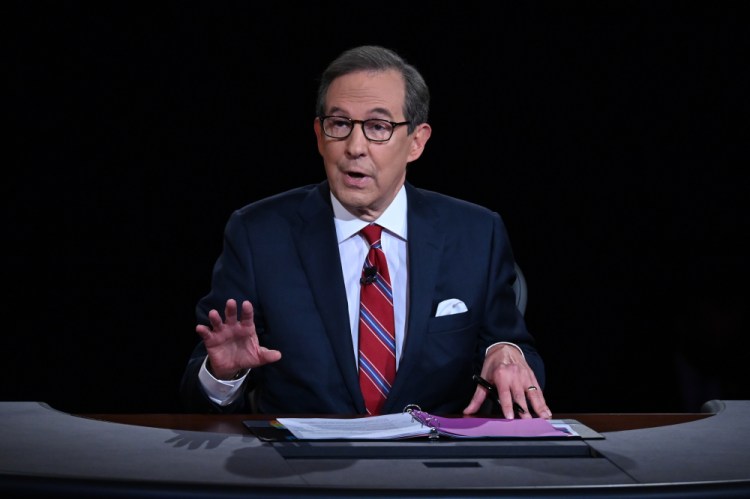 Chris Wallace of Fox News, shown moderating the first presidential debate of 2020, announced Sunday that he's leaving the network after 18 years. (Olivier Douliery/Pool via AP, File)