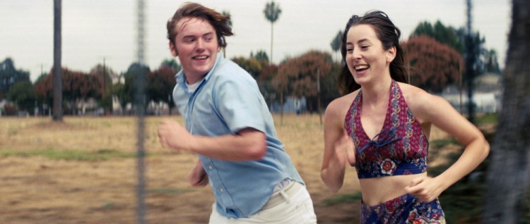 Cooper Hoffman and Alana Haim in a scene from "Licorice Pizza." They were picked for their breakthrough performances in the coming-of-age comedy. 