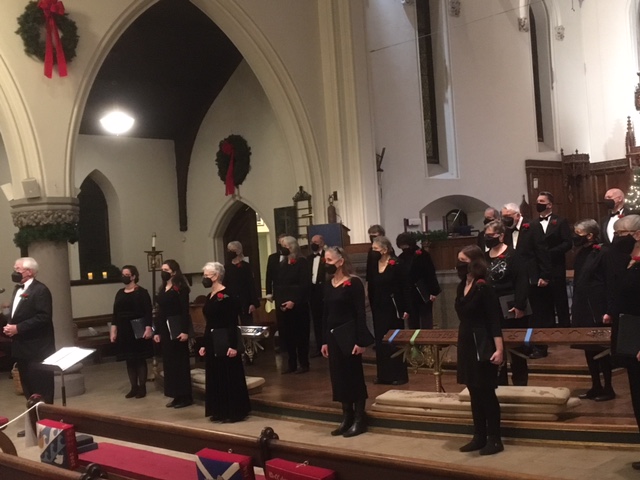 Renaissance Voices perform in masks at St. Luke's Cathedral. 