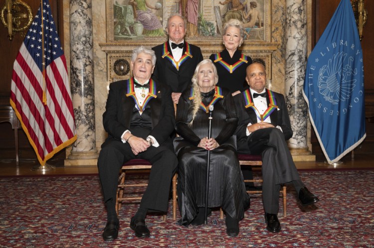 2021 Kennedy Center honorees Justino Díaz, from left, Lorne Michaels, Joni Mitchell, Bette Midler and Berry Gordy pose following the Medallion Ceremony for the 44th annual Kennedy Center Honors on Saturday at the Library of Congress in Washington. 
