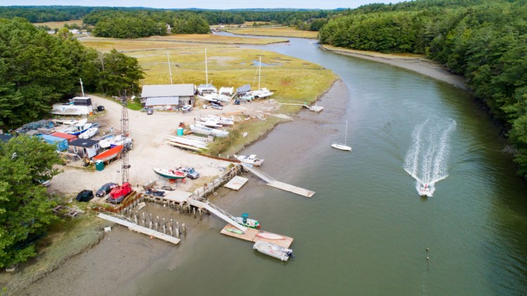 An aerial shot of the Cousins River boatyard in Yarmouth, taken in September. A newly formed nonprofit called the Sea Meadow Marine Foundation purchased the 12-acre working waterfront property this month with plans to preserve and expand it.
