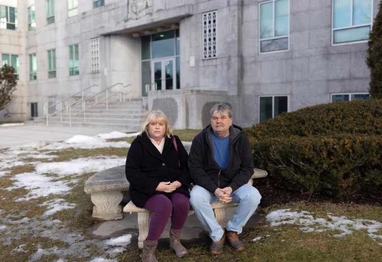 Natalie and Millard Jackson outside the Cross Building in Augusta, where the Maine Attorney General’s office is located. They await a final report on the fatal shooting of their son, Gregori, 18, by a police officer in 2007.