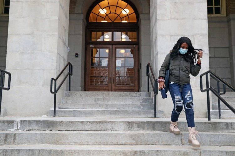 Portland High School freshman Jese Francine leaves the school on Wednesday. Portland has proposed a consolidated high school that could include Portland, Deering, PATHS and adult education all in one facility.