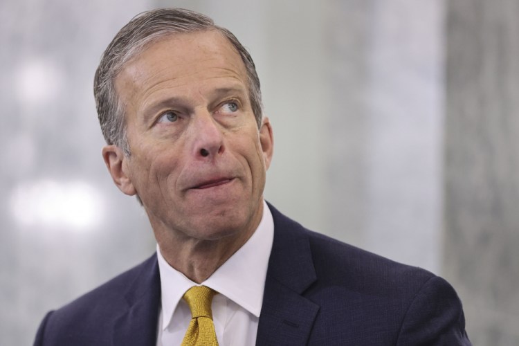 Sen. John Thune, R-S.D., listens during a Senate Commerce, Science and Transportation Committee hearing on Rhode Island Gov. Gina Raimondo's' nomination to be Commerce secretary on Capitol Hill in Washington on Jan. 26.