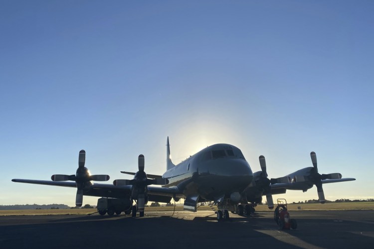 In this photo provided by the New Zealand Defense Force, an Orion aircraft is prepared at a base in Auckland, New Zealand, on Monday, before flying to assist the Tonga government after the eruption of an undersea volcano. 