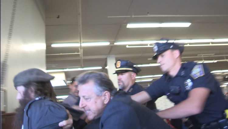 "Why Is This Happening?" captures police arresting filmmaker Rod Webber.