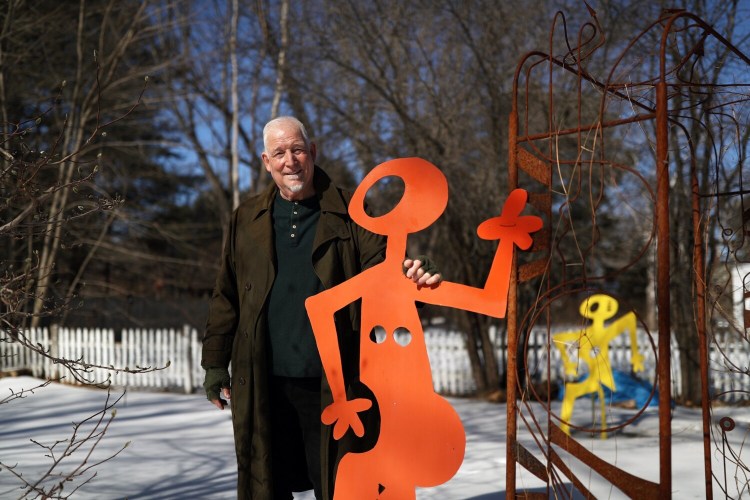 Storyteller Chris Newcomb stars in "Think You Might Be Wrong" at Footlights Theatre in Falmouth. He also makes metal sculptures, like these in his yard in Gorham. 