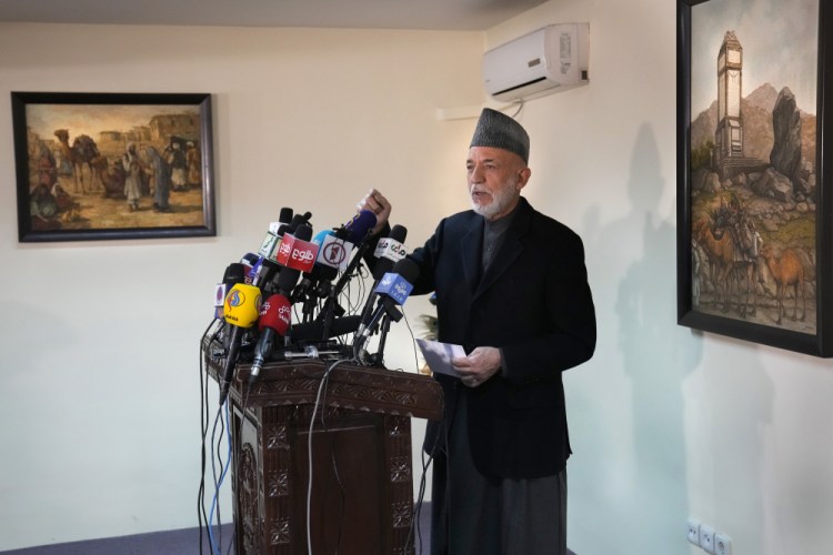 Afghanistan's former President Hamid Karzai speaks during a press conference, in Kabul, Afghanistan, Sunday. 