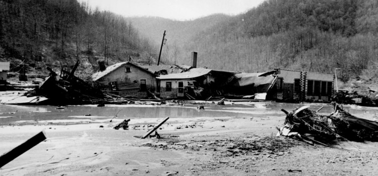 Destroyed homes and businesses are piled up against each other in the Dingess Hollow area of Lorado, W. Va., after the Buffalo Creek Dam broke on Feb. 26, 1972. 