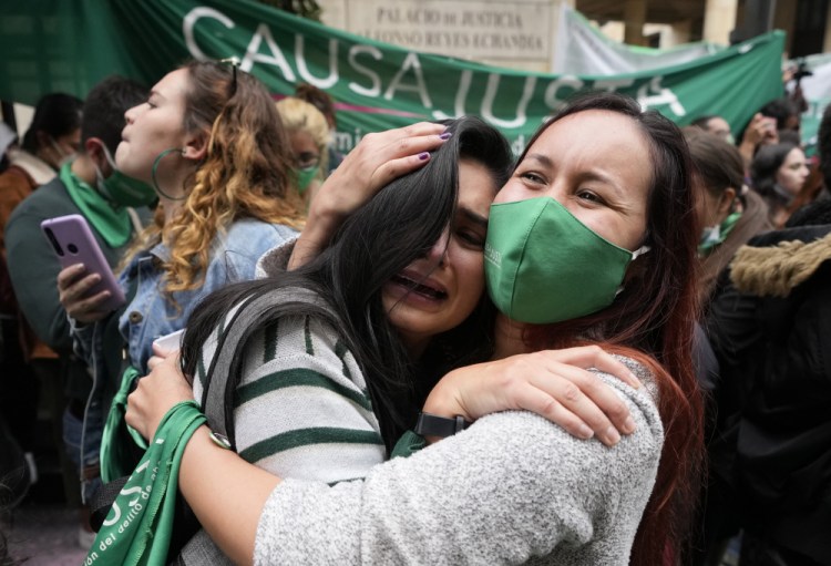 Abortion-rights activists celebrate in Bogota, Colombia, on Monday after the Constitutional Court approved the decriminalization of abortion, lifting all limitations on the procedure until the 24th week of pregnancy. 


