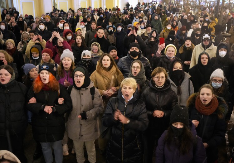 Demonstrators shout slogans in St. Petersburg, Russia, on Friday. 