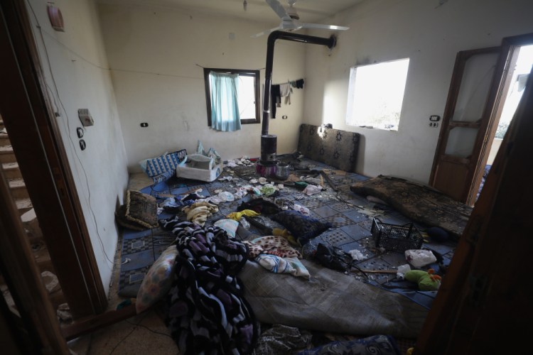 A damaged room and windows are seen inside a house after an operation by the U.S. military in the Syrian village of Atmeh in Idlib province, Syria, on Thursday. 