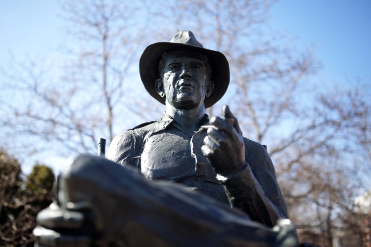 The John Ford statue at the corner of Pleasant, Center and York streets in Portland's Old Port. 