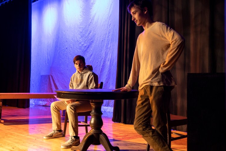  Ben Shields, left, and Connor Haskell rehearse their scene in the play, “Odd Jobs" at Cheverus High School in Portland. 