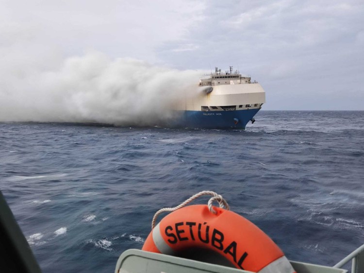 Smoke billows from the burning Felicity Ace car transport ship southeast of the Azores islands. It sank Tuesday, 13 days after a fire broke out on board. 

