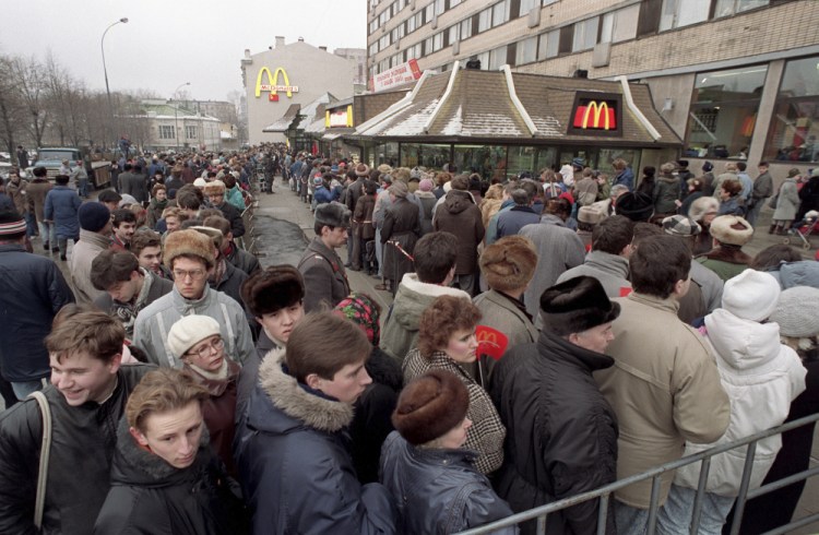 Hundreds line up outside the first McDonald's restaurant in the Soviet Union on its opening day in Moscow on Jan. 31, 1990. 