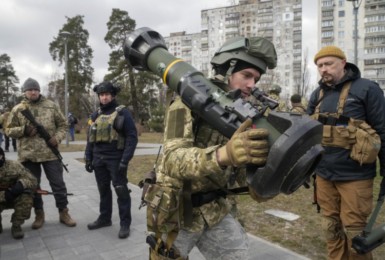 A Ukrainian soldier holds an anti-tank weapon near Kyiv on March 9.