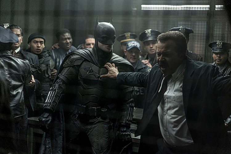 Robert Pattinson, center, and Jeffrey Wright in "The Batman."