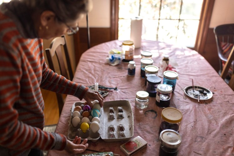 Sochor with some of her psyanky she is in the middle of making at her home in Brooks. Sochor, whose parents fled Ukraine in the 1940s, grew up making the traditional eggs with her family.