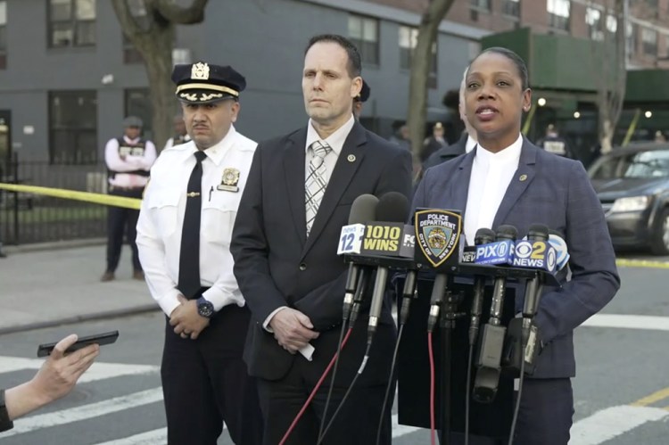 New York Police Commissioner Keechant Sewel, right, speaks during a news conference on Friday.
