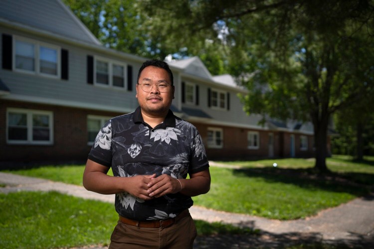 Marpheen Chann in Riverton Park, where he lived with his mother as a child before being put into foster care and then adopted. His memoir "Moon in Full" deals with his journey though foster care and coming out as gay. 