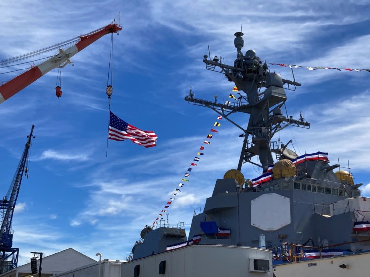 The superstructure of the future USS Basilone and a crane are seen on Saturday at Bath Iron Works.