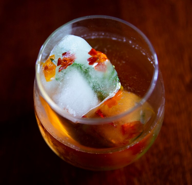 Keep your ice tea cool, and beautiful, with Ice cubes studded with nasturtiums and gem marigolds. 
