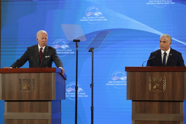 President Biden, left, gives a press conference with Israel's Prime Minister Yair Lapid, at the Waldorf Astoria Hotel in Jerusalem on Thursday.