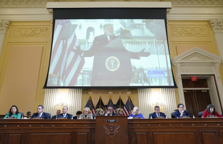 A video of former President Donald Trump speaking during a rally near the White House on Jan. 6, 2021, is shown to House committee investigating the Jan. 6 Capitol riot. Members are, from left, Rep. Stephanie Murphy, D-Fla., Rep. Pete Aguilar, D-Calif., Rep. Adam Schiff, D-Calif., Rep. Zoe Lofgren, D-Calif., Chairman Bennie Thompson, D-Miss., Vice Chair Liz Cheney, R-Wyo., Rep. Adam Kinzinger, R-Ill., Rep. Jamie Raskin, D-Md., and Rep. Elaine Luria, D-Va.