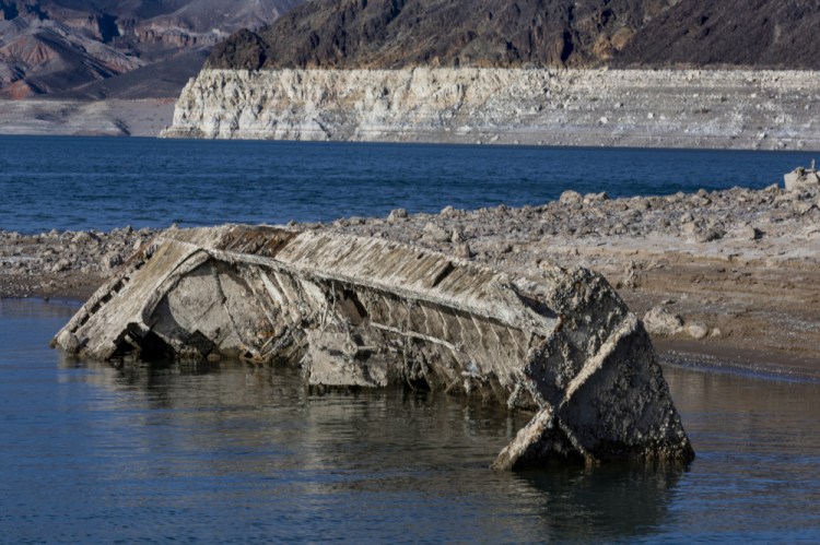 A WWII-era landing craft used to transport troops or tanks was revealed on the shoreline near the Lake Mead Marina as the waterline continues to lower at the Lake Mead National Recreation Area.