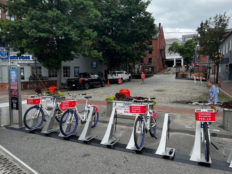 The Tandem Mobility  bike share station at the intersection of Dana and Commercial Streets.