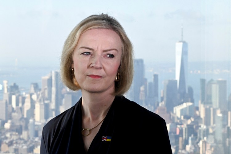 British Prime Minister Liz Truss speaks to the media on the occasion of her visit at the Empire State building in New York, Tuesday, Sept. 20, 2022. (Toby Melville/Pool Photo via AP)
