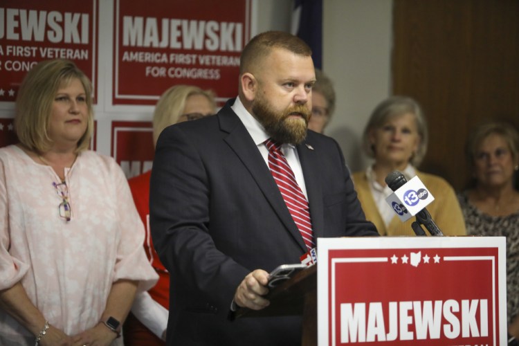 Ohio Republican congressional candidate J.R. Majewski defends his military record during a news conference Friday at the Lucas County Republican headquarters in Holland, Ohio. 