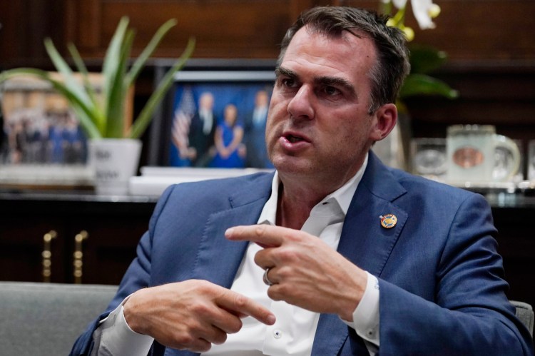 Oklahoma Gov. Kevin Stitt is pictured during an interview in his office Wednesday, Aug. 3, 2022, in Oklahoma City. (AP Photo/Sue Ogrocki)