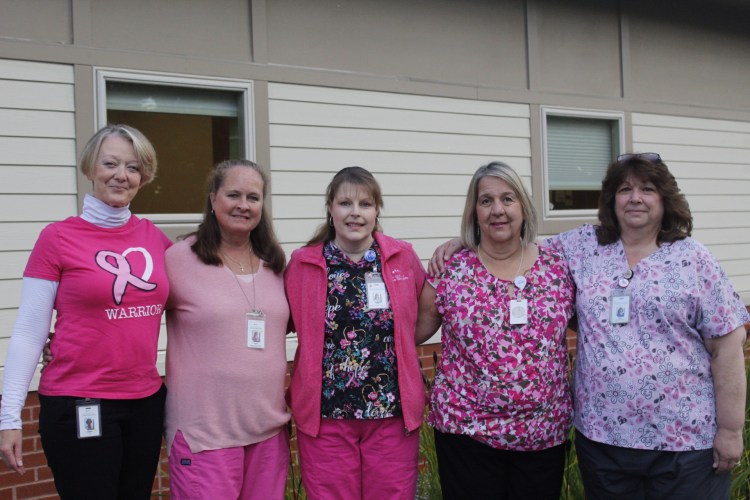 Claire Cote with NECS colleagues and fellow breast cancer survivors Terri, Lisa, Alison, and Jennifer.