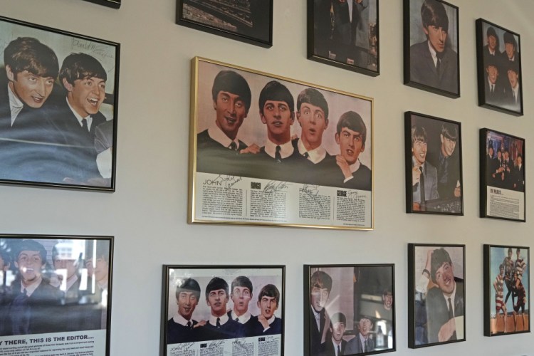 Copies of Ray Cordeiro's Beatles' autographs are framed and displayed at his home. The originals are kept with a lawyer.  (AP Photo/Kin Cheung, File)