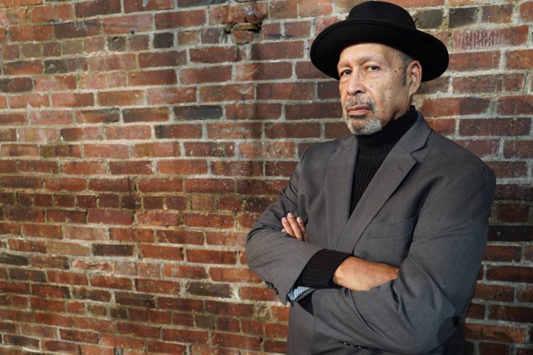 Actor Lance E. Nichols poses in character as the late playwright August Wilson.