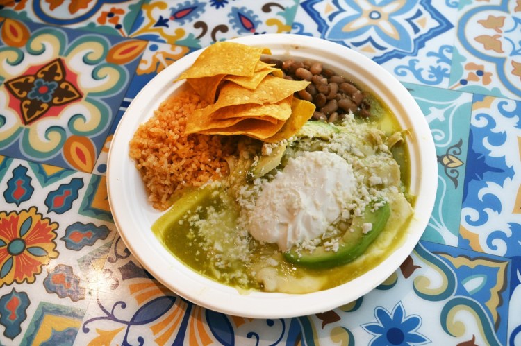 Enchiladas Verde, a cheesy, chicken-and-soft-tortilla bake dunked in a luscious tomatillo stew of pulled white-meat chicken, is Taco Trio's most popular dish. But it doesn't hold up for take-out as well as many of the restaurant's other dishes. 